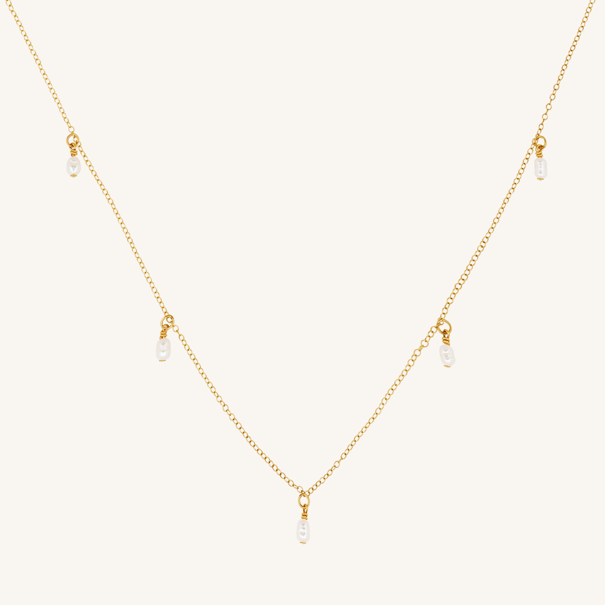 Gold pearl drop necklace
