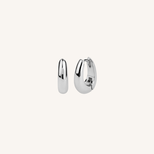 Pair of silver hoop earrings on a white background