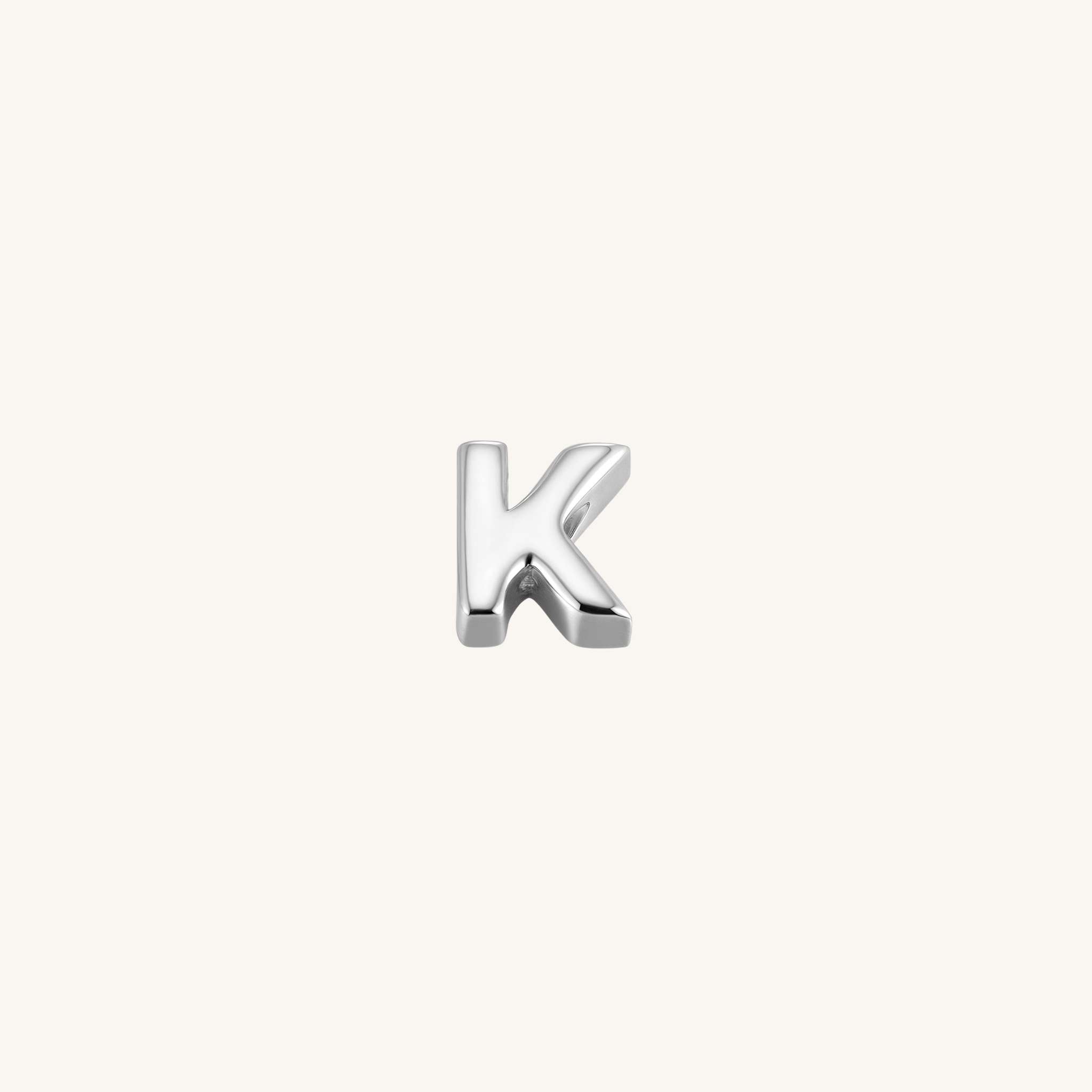 Letter K charm in silver