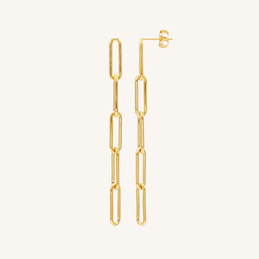 A pair of gold paperclip chain drop earrings with post-back closures, shown against a solid off-white background.