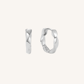 Pair of silver hoop earrings on a white background