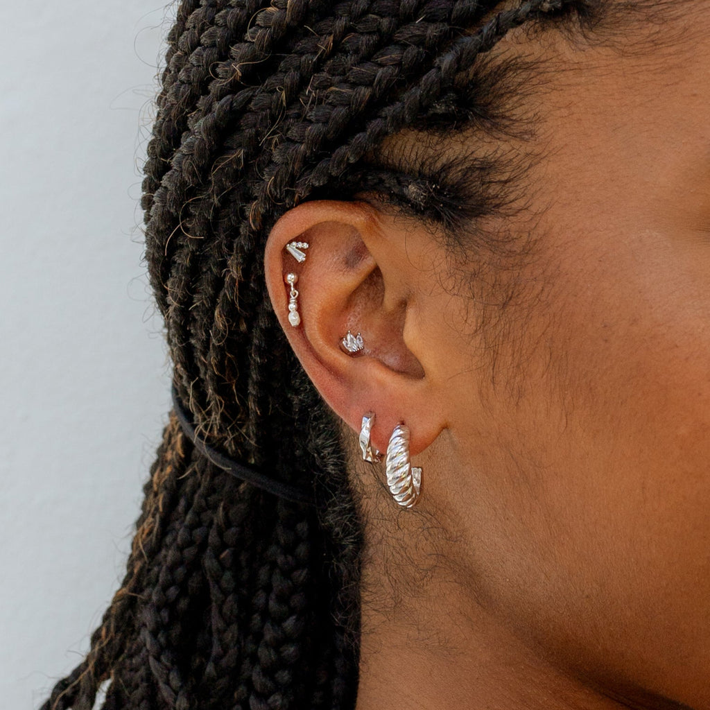 Model wearing Leanne Twisted earrings - Silver