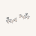 A pair of silver-toned stud earrings with clear Cubic Zirconia crystals, displayed on a clean off-white background.
