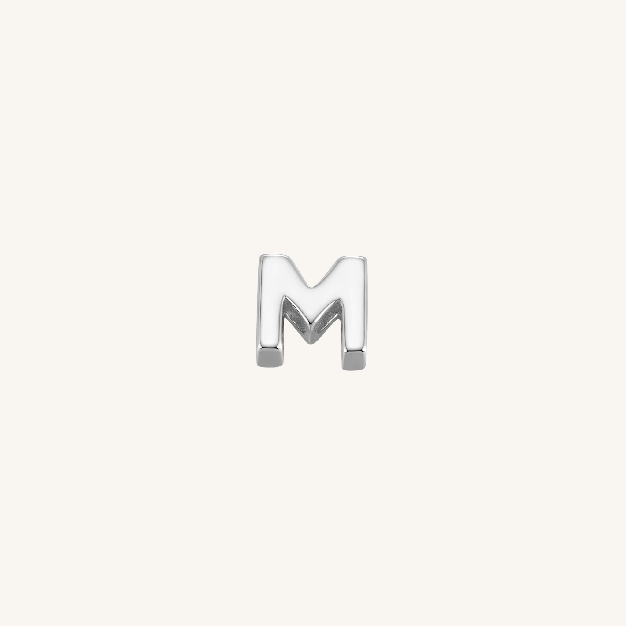 Letter M charm in silver