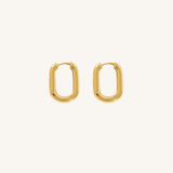 Gold hoop earrings on a white background