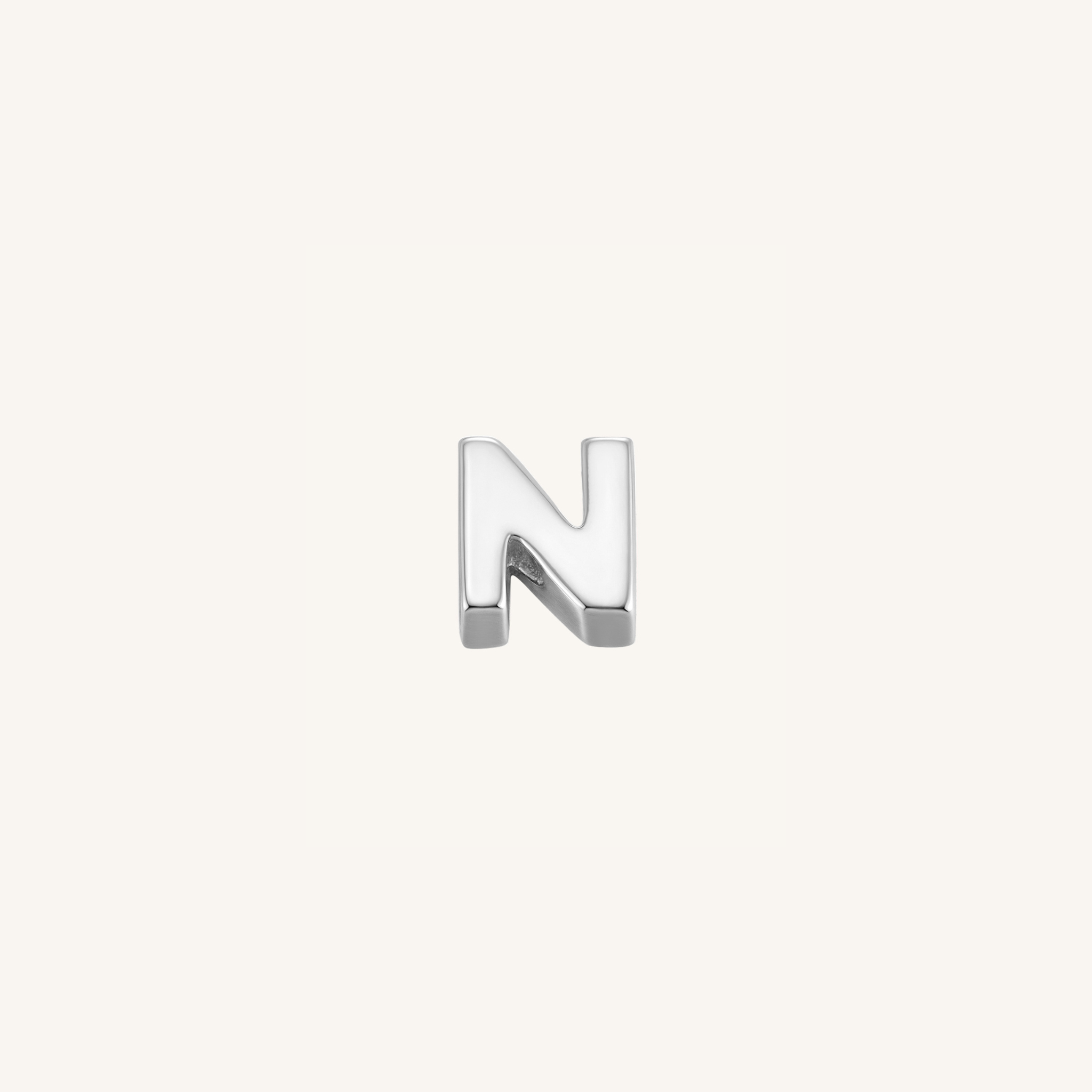 Letter N charm in silver