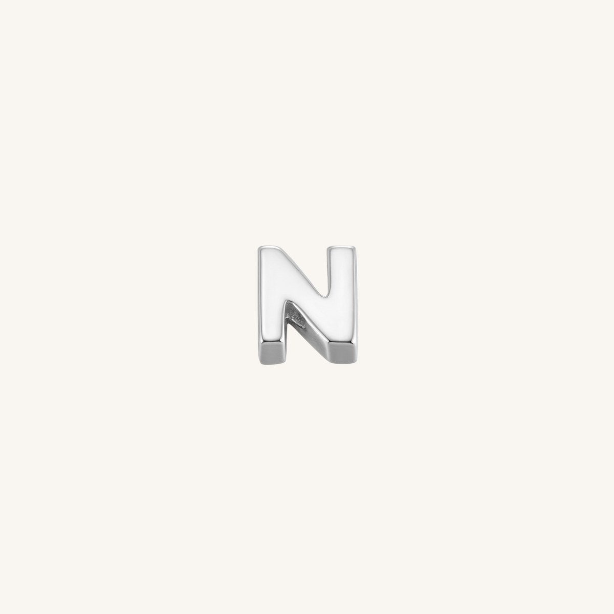 Letter N charm in silver