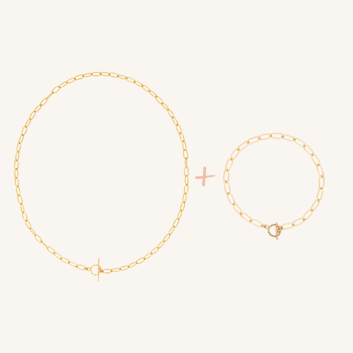 A gold chain necklace and matching gold chain bracelet displayed on a light cream background, separated by a small pink plus sign.