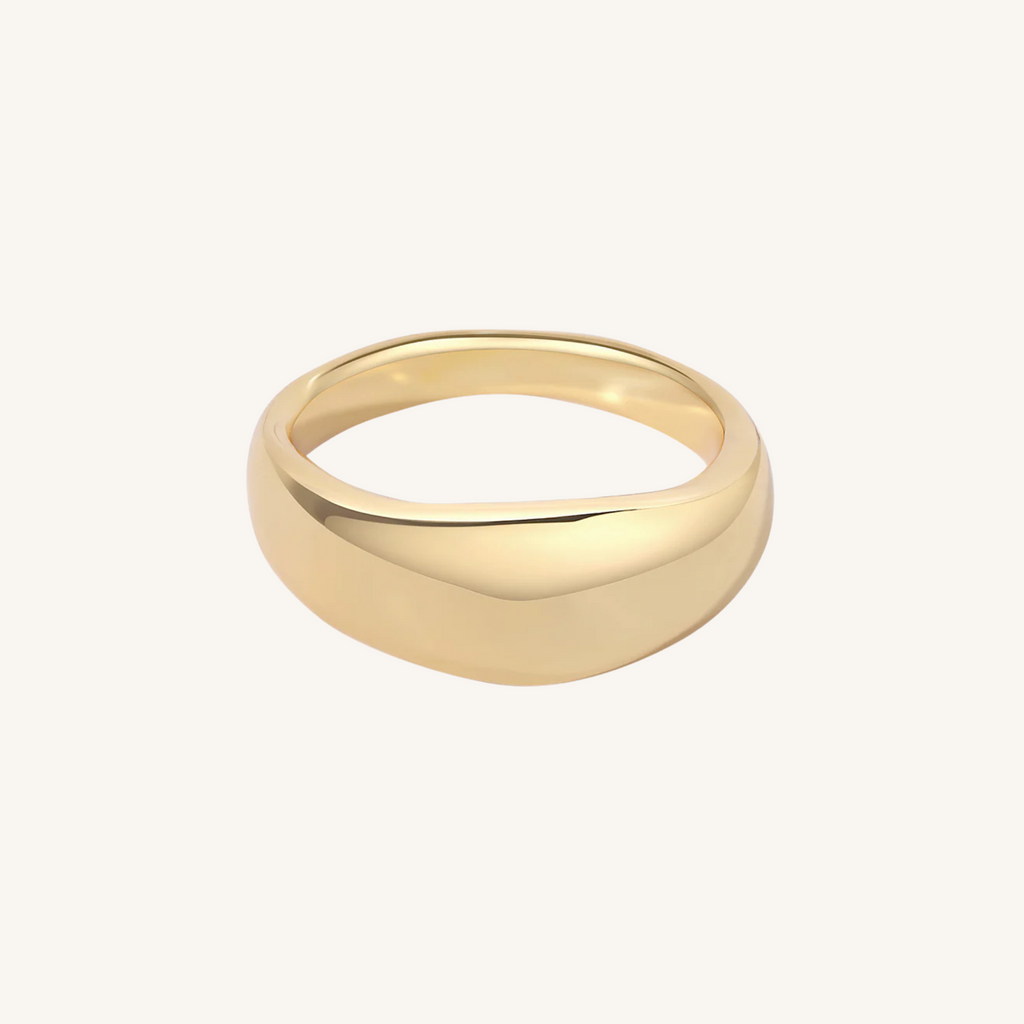 Gold ring on a white background