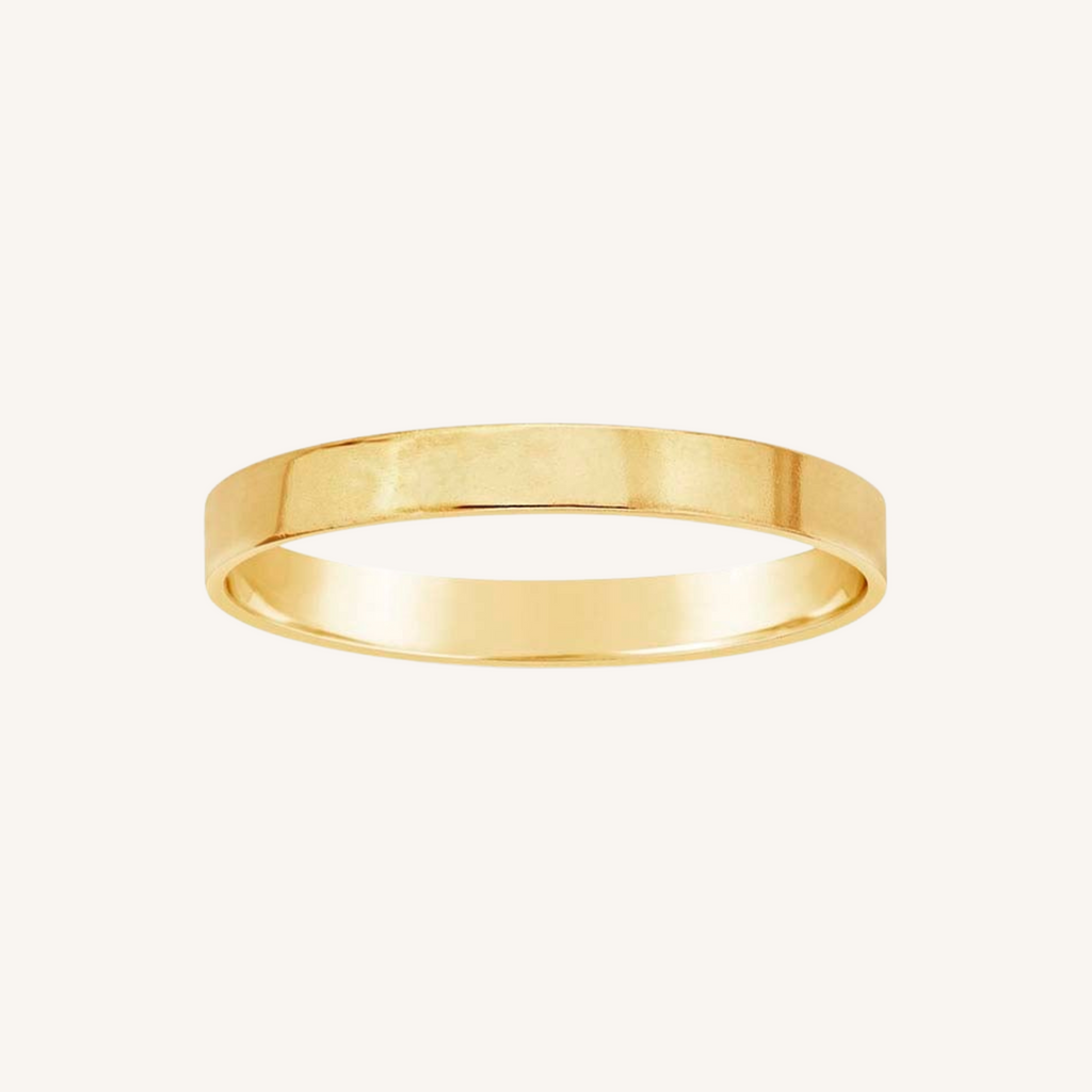 Gold ring on a white background