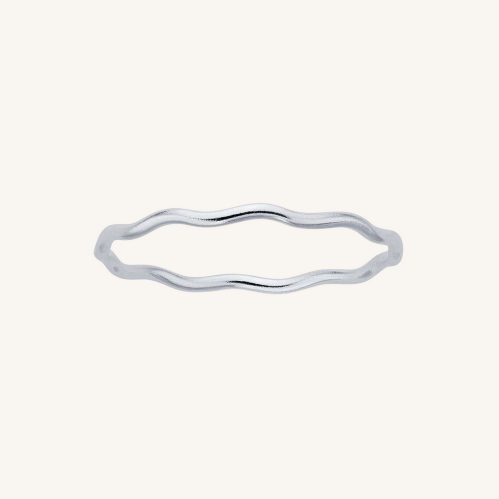 Wave silver ring on a white background
