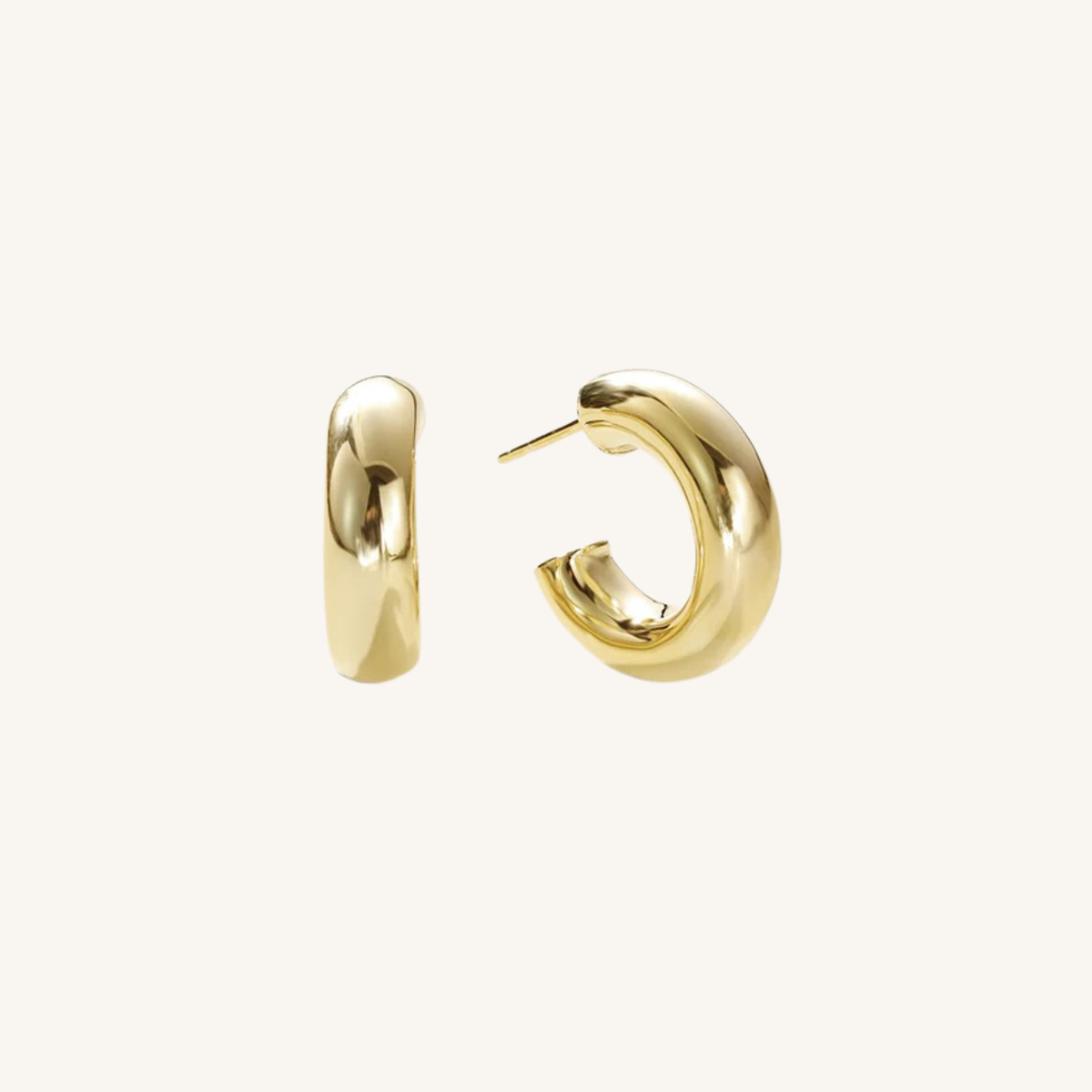 A pair of polished gold huggie hoop earrings, shown from two angles (side and back) on a clean, off-white background.