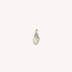 A small silver shell-shaped jewelry charm with a loop at the top, centered on a plain off-white background.