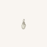 A small silver shell-shaped jewelry charm with a loop at the top, centered on a plain off-white background.