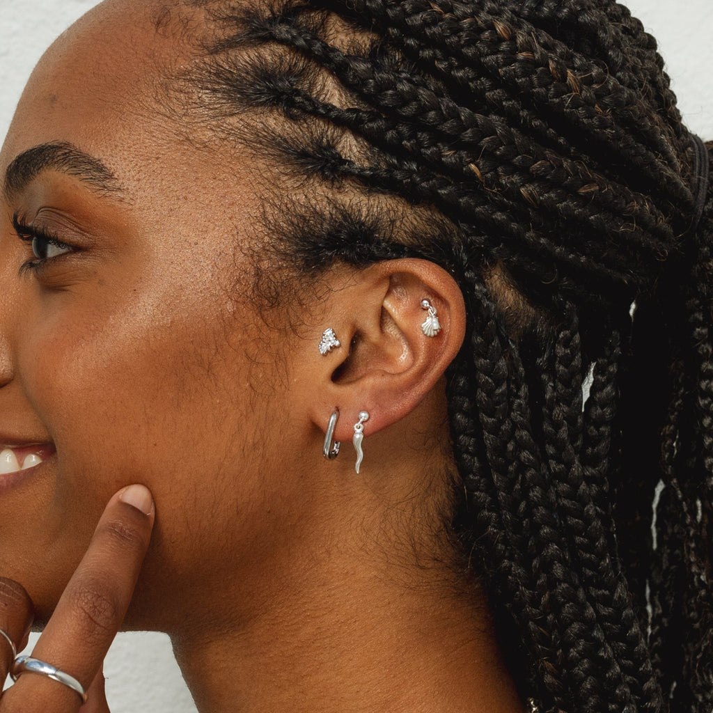 Model Wearing Star Dust Barbell Earring in Silver