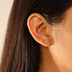 Model wearing Starry Night Barbell Earringin in Gold