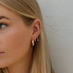 Tierney Earrings in Rose Gold on model