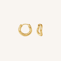 Gold hoop earrings on a white background