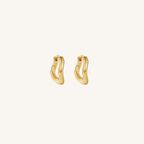 Gold hoop earrings on a white background