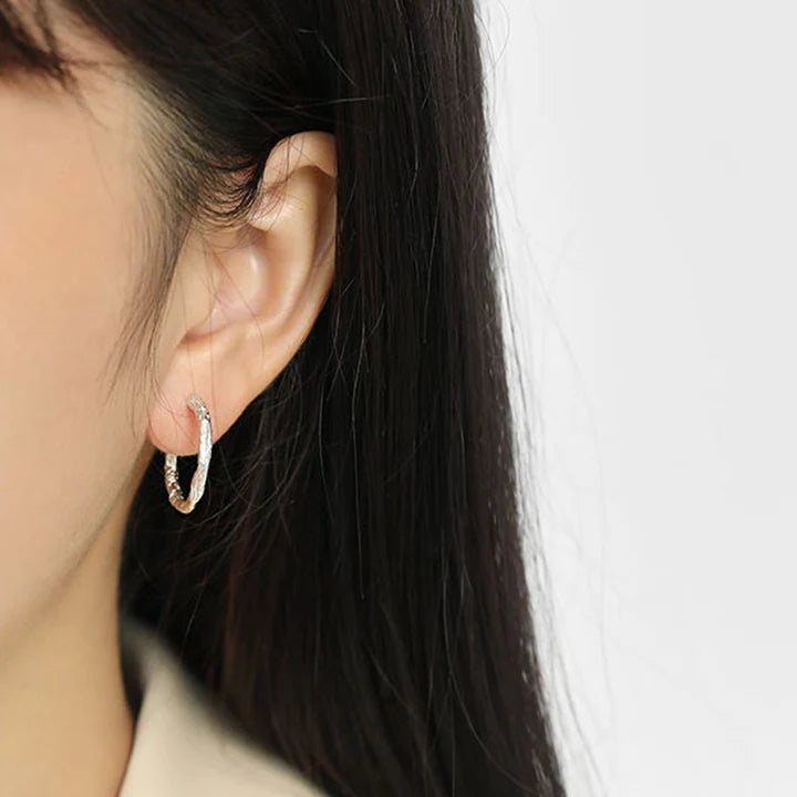 WithLovehoopedearrings-model shots ilver model wearing the silver earrings 