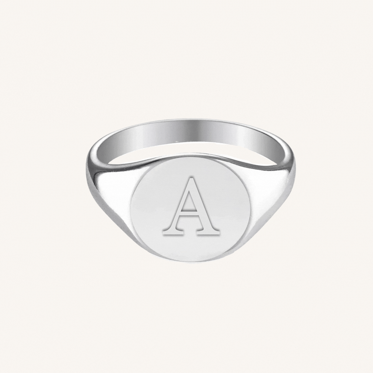 Signature Signet Ring in sterling silver, angled view showing the engravable oval face
