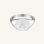 Signature Signet Ring in sterling silver, angled view showing the engravable oval face